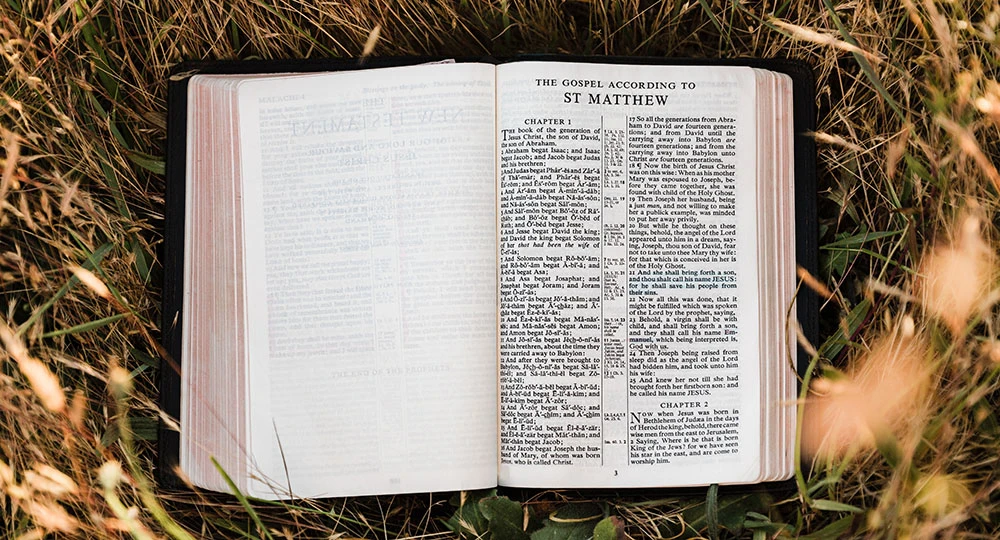 Bible opened to the book of Matthew
